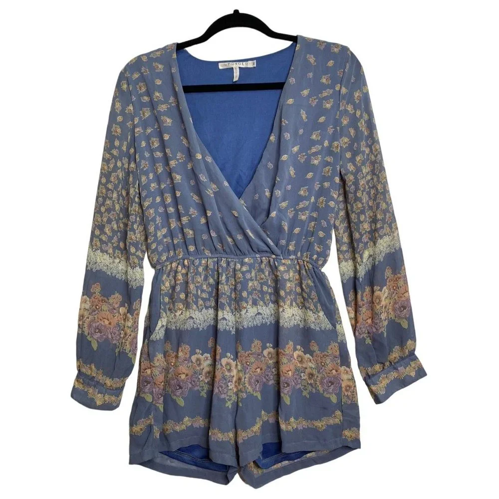 The Hanger Floral Romper Size Medium Baby Blue Long Sleeve Pockets Floral Shorts